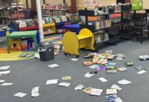 WIndows smashed, books strewn in library attack