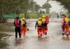 Rescuers pull two from flooded creek