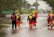 Rescuers pull two from flooded creek