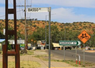 Man arrested after runner hit in face